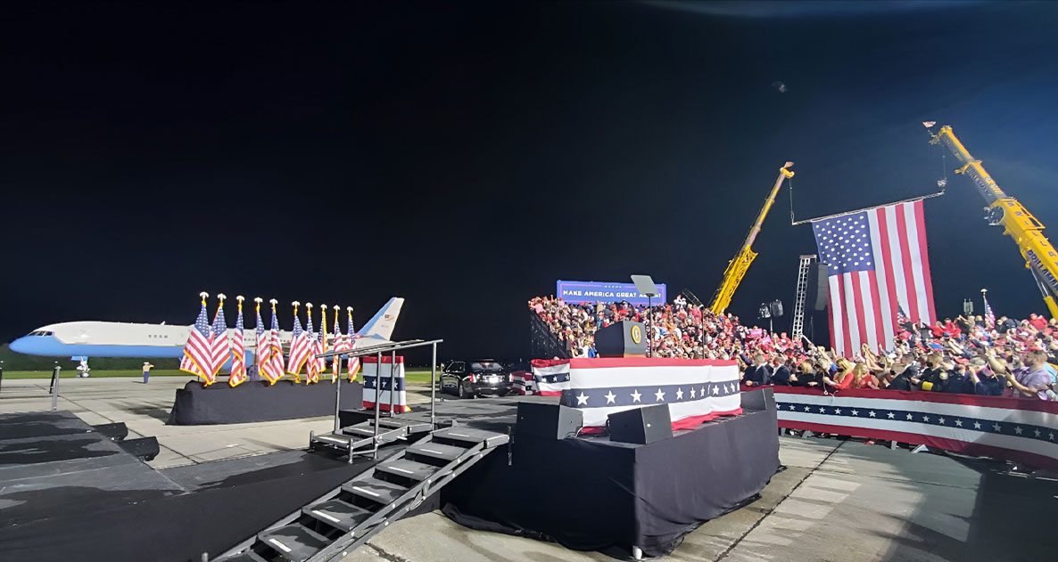 A stage with an american flag on it
