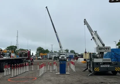 A crane is in the middle of a construction site.